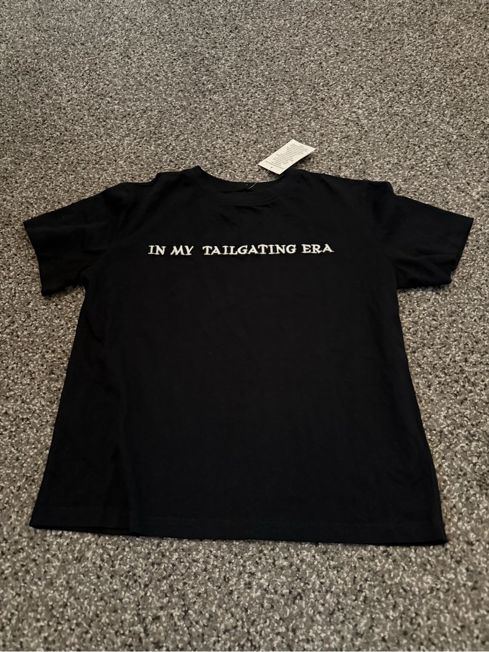 Buckle Black Tee with White 'In My Tailgating Era' Text